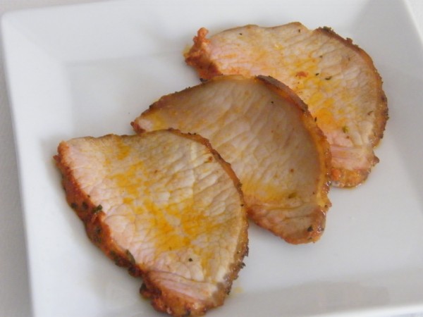 Filetes adobados de cerdo con refresco de naranja